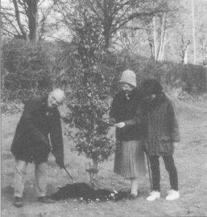 Tree planting by the Chairman, Robin Merton and two of the tree wardens, Gillian Bauer (centre) and Alison Hull