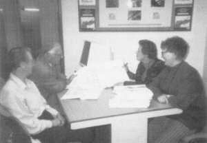 Some members of the Development Control Committee examining plans at the City Council Offices
