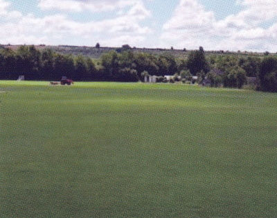 Looking across King George V playing fields towards Chilcomb House, part of the East Winchester Downs LCA